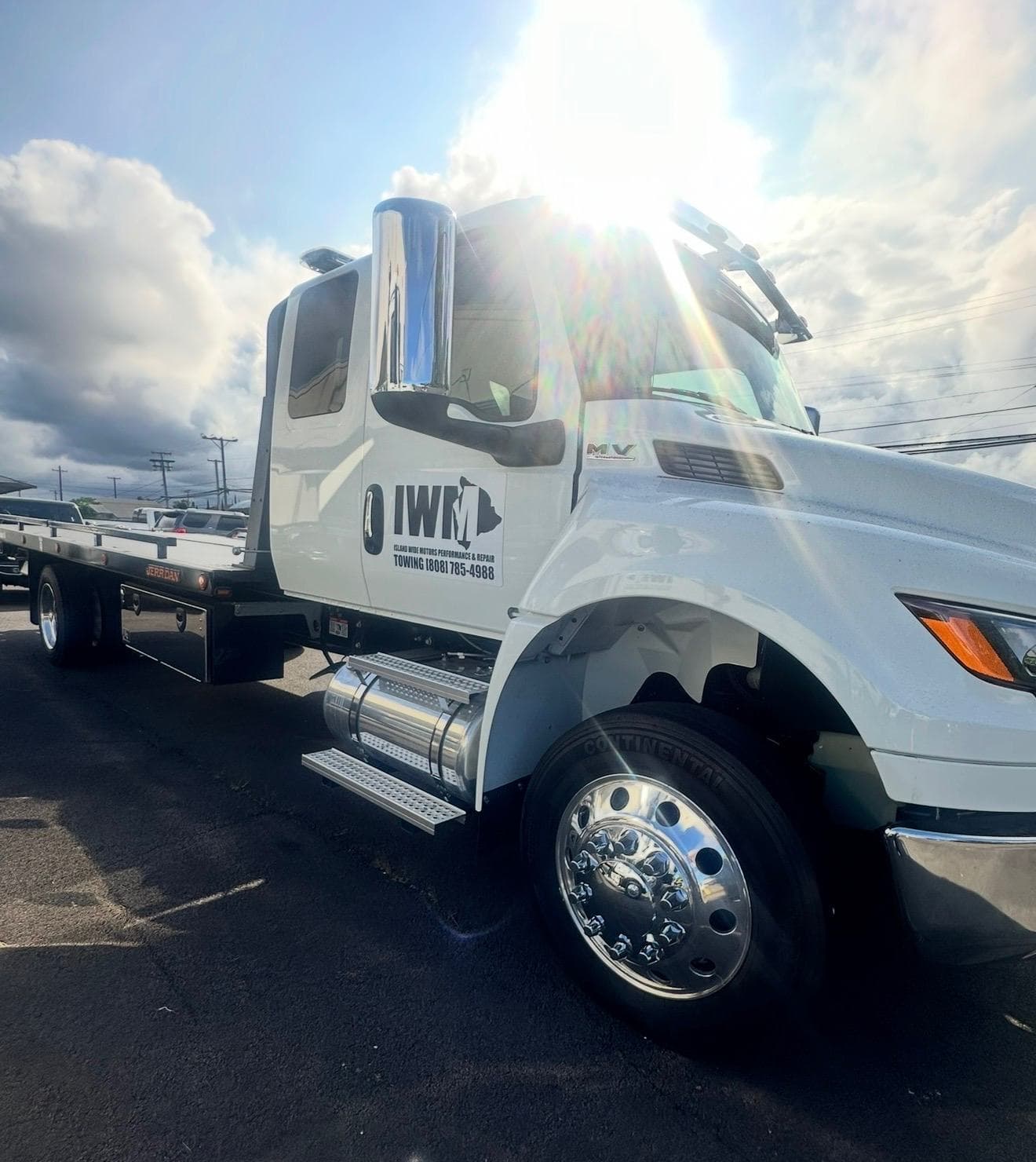 Island Wide Motors flatbed tow truck